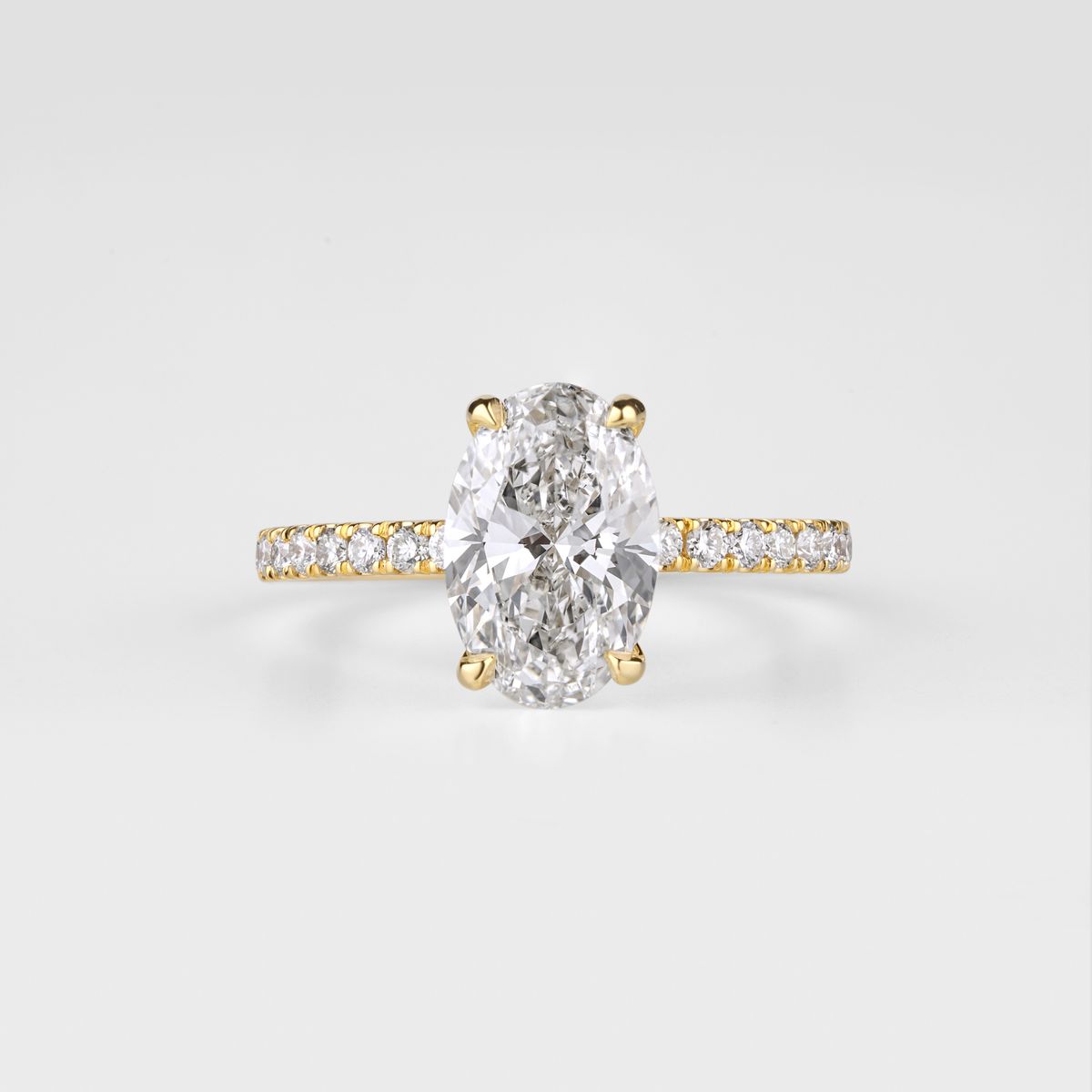 An oval lab-grown diamond solitaire ring in gold